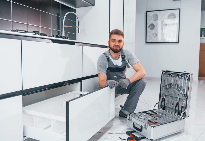 young-professional-plumber-in-grey-uniform-using-e-resize.jpg young-professional-plumber-in-grey-uniform-using-e-resize.jpg